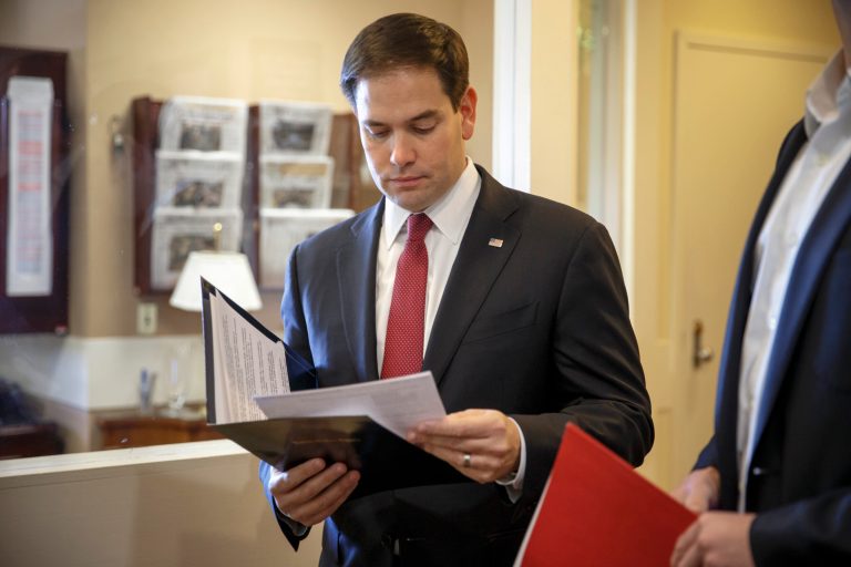 Sen. Marco Rubio, R-Fla., the son of Cuban immigrants, prepares his statement before a news conference where he expressed his disappointment in President Barack Obama's initiative to normalize relations between the United States and Cuba, Wednesday, Dec. 17, 2014, on Capitol Hill in Washington. (AP Photo/J. Scott Applewhite)