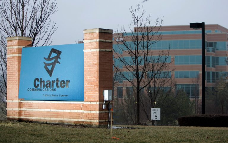 FILE - In this Feb. 25, 2008 file photo, Charter Communications offices are seen in St. Louis. Charter Communications Inc. said Tuesday, Feb. 11, 2014, that it's nominating a full slate of 13 candidates for election to Time Warner Cable Inc.'s board as it pushes forward with its hostile takeover bid.  (AP Photo/Jeff Roberson, file)