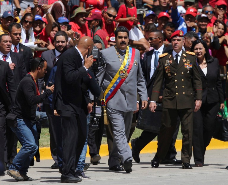 Trump can convert a potential crisis into an early victory by working to fashion a multilateral rescue of Venezuela. (AP Photo/Fernando Llano)