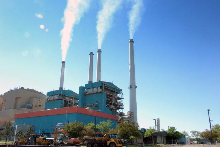 The EPA's climate rules place the onus on states to reduce emissions from existing power plants by 2030. (AP Photo)