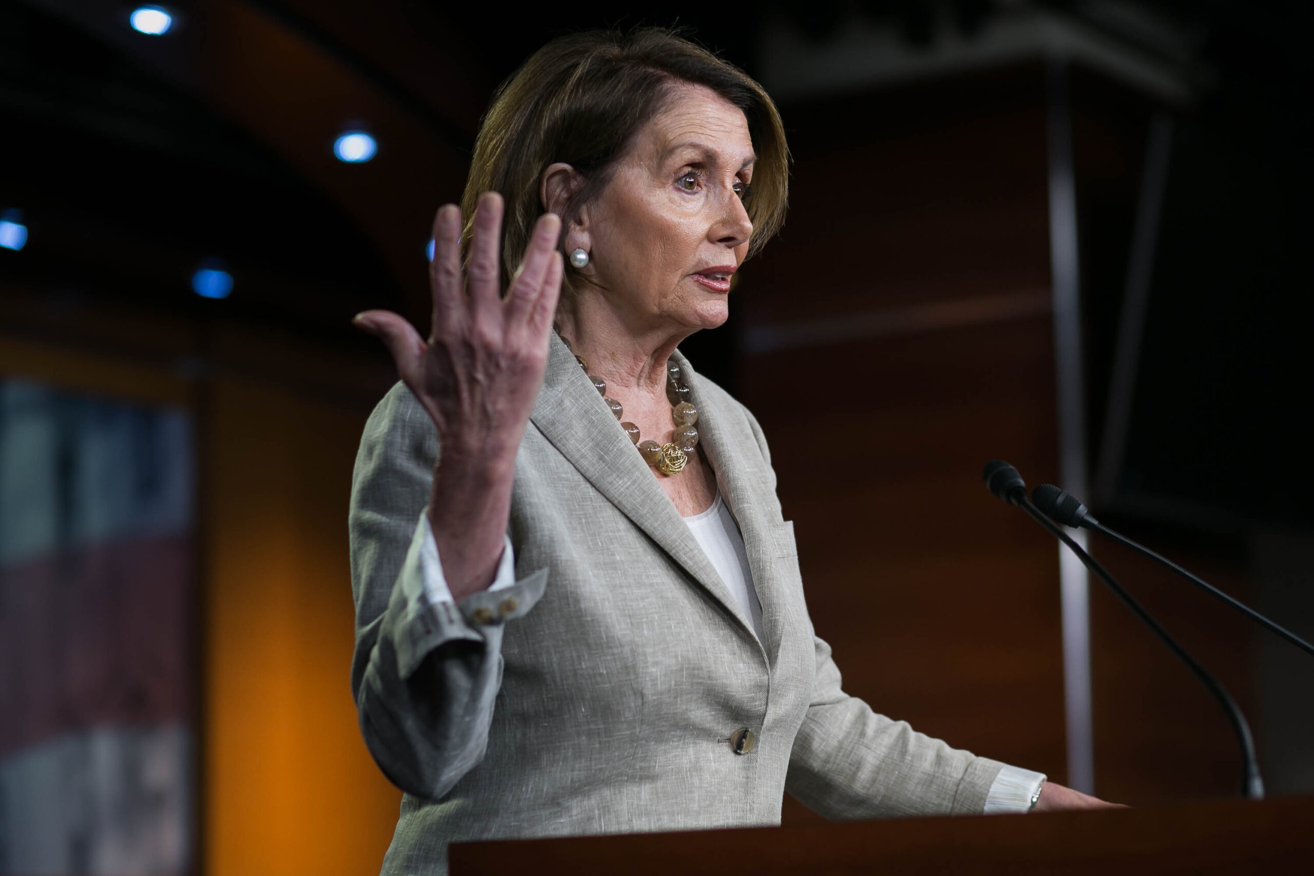 Pelosi waves white flag on trade — for now