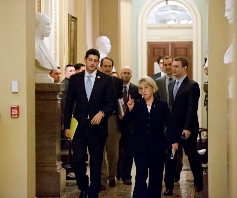 House Budget Committee Chairman Paul Ryan, R-Wis., left, and Senate Budget Committee Chairwoman Patty Murray, D-Wash., walk together as they head a news conference to announce a tentative agreement between Republican and Democratic negotiators on a government spending plan, at the Capitol in Washington, Tuesday, Dec. 10, 2013. Negotiators reached the modest budget agreement to restore about $65 billion in automatic spending cuts from programs ranging from parks to the Pentagon, with votes expected in both houses by week's end. (AP Photo/J. Scott Applewhite)