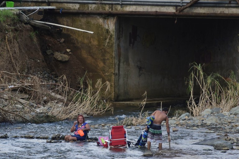 Finding clean drinking water on the island has been a challenge for citizens in the wake of the devastation from Hurricanes Irma and Maria. (AP Photo/Carlos Giusti)