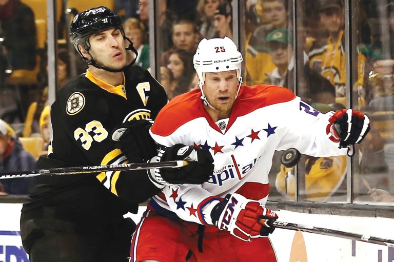 Winslow Townson/AP
Zdeno Chara and the Bruins got physical with Jason Chimera and the Caps from the start of their victory at TD Garden.