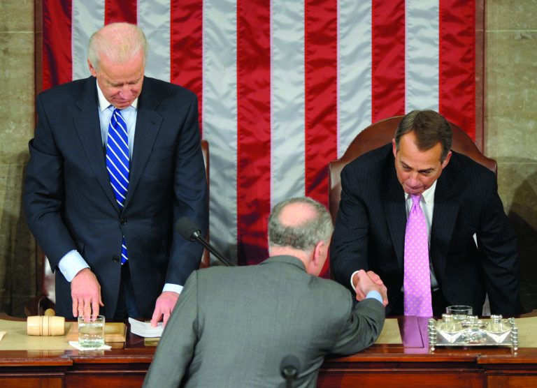 Vice President Joe Biden watches at left as Sen. Charles Schumer, D-N.Y., center, shakes hands with House Speaker John Boehner of Ohio, right, in the House Chamber during the counting of Electoral College votes on Capitol Hill in Washington, Friday, Jan. 4, 2013. Biden presided over a Joint Session of Congress Friday as four members of the House and Senate took turns announcing the votes that had been tallied in state capitals last month affirming the re-election of Barack Obama as President of the United States. (AP Photo/Susan Walsh)