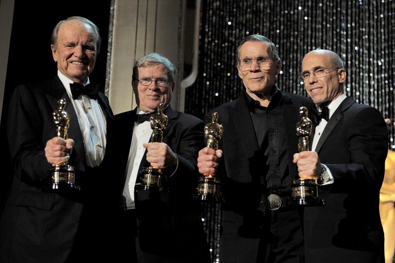   From left, award recipients George Stevens Jr., D.A. Pennebaker, Hal Needham and Jeffrey Katzenberg poses with their Oscar statuettes at the 4th Annual Governors Awards at Hollywood and Highland Center's Ray Dolby Ballroom on Saturday, Dec. 1, 2012, in Los Angeles. (Photo by Jordan Strauss/Invision/AP)  