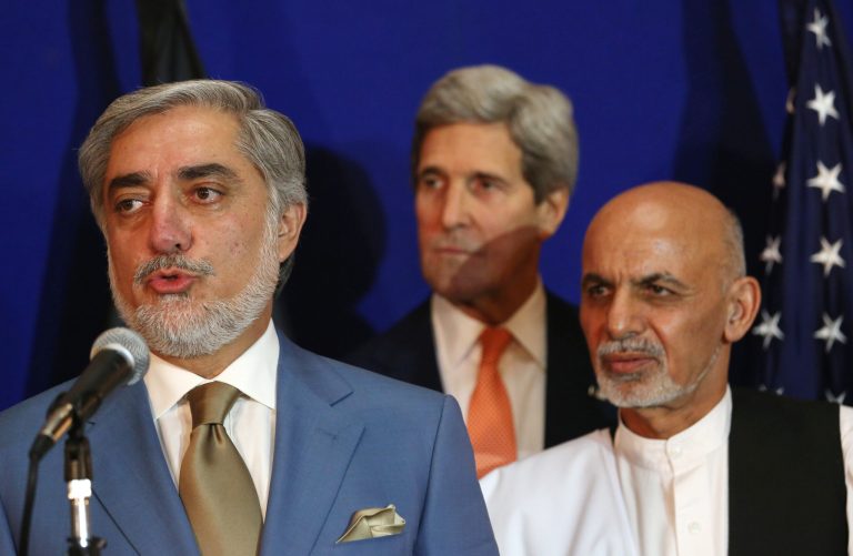Afghan presidential candidate Abdullah Abdullah, from left, speaks as U.S. Secretary of State John Kerry and another candidate Ashraf Ghani Ahmadzai listen during a joint press conference in Kabul, Afghanistan, Friday, Aug. 8, 2014. Abdullah called the agreement on the disputed presidential election 