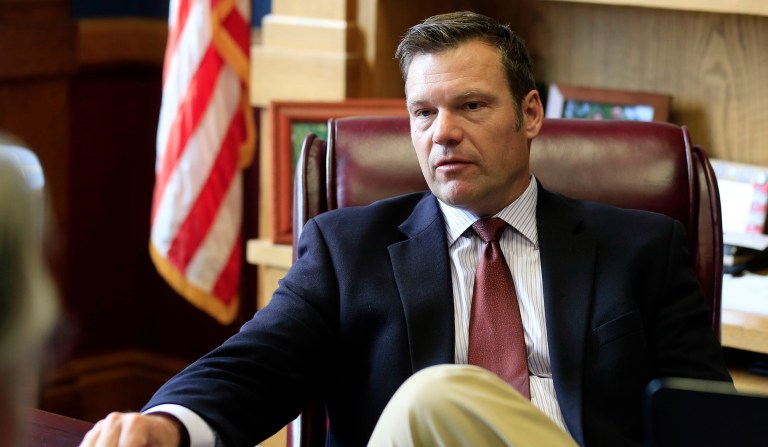 According to Citizens for Responsibility and Ethics in Washington's complaint, Kris Kobach -- vice chairman of the Trump administration's Presidential Advisory Commission on Election Integrity -- has been paid for writing columns for Breitbart News. One of those was written in his official capacity with the election commission, which alleged serious voter fraud in New Hampshire. (AP Photo/Orlin Wagner, File)