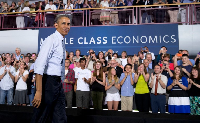 A Texas judge on Tuesday threw out President Obama's new rule intended to force companies to pay workers more overtime. (AP Photo/Carolyn Kaster)