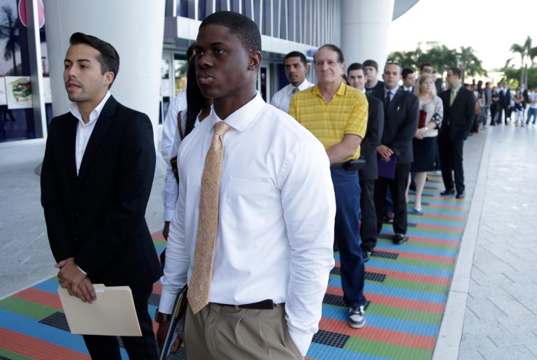 Students wait in line at a job fair held by the Miami Marlins at Marlins Park in Miami on Oct. 23. (AP Photo/Lynne Sladky)