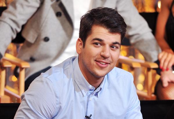 Rob Kardashian handcuffed for chasing pap