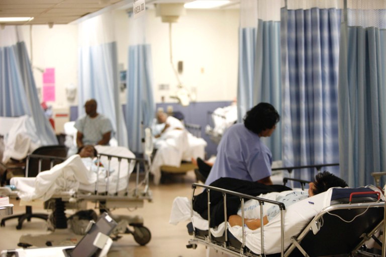 Patients are cared for at the emergency room at Jamaica Hospital is seen in New York, Monday, March 22, 2010.  (AP Photo/Seth Wenig)