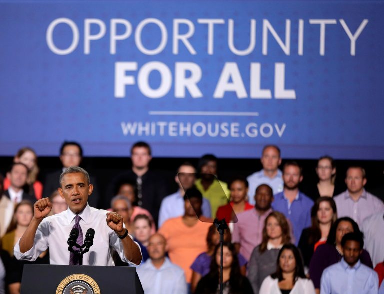 President Obama speaks about the economy, Wednesday, July 30, 2014, at the Uptown Theater in Kansas City, Mo. (AP Photo/Charlie Riedel)