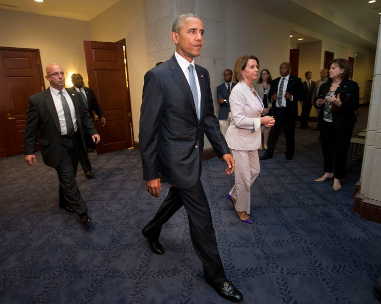 President Obama and House Minority Leader Nancy Pelosi leave a meeting on Friday. The president's 11th-hour appeal failed to swayÂ to Democrats, including Pelosi,Â to pass the legislation, including Pelosi. (AP Photo/Pablo Martinez Monsivais)