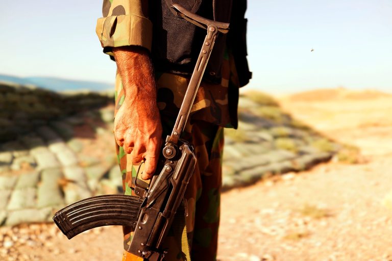Kurdish soldiers with the Peshmerga keep guard near the frontline with Sunni militants on the outskirts of Kirkuk, an oil-rich Iraqi city on June 25 in Kirkuk, Iraq. (Spencer Platt/Getty Images)