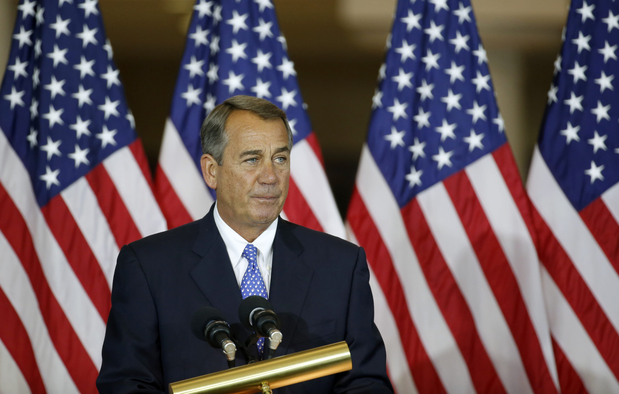 Obama praises Boehner for $1.1 trillion spending deal