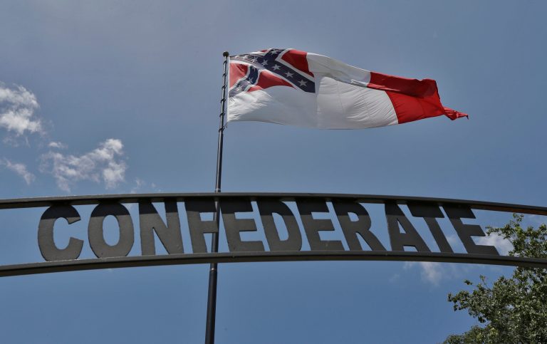 The Third Official Flag of the Confederacy flies over Confederate Memorial Park Thursday, Aug. 17, 2017, in Tampa, Fla. (AP Photo/Chris O'Meara)