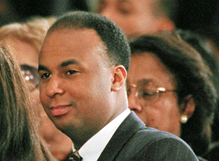 FILE - This April 10, 1996 file photo shows Michael A. Brown attending funeral services for his father, former Commerce Secretary Ron Brown at the Washington's National Cathedral in Washington. Former District of Columbia Councilmember Brown could be sentenced to nearly four years in prison for taking more than $50,000 in bribes in an undercover FBI sting. A federal judge in Washington will sentence Brown Thursday afternoon. Prosecutors are asking for a prison term of 43 months, the most he could get under the terms of a plea bargain he struck last year. Brown's lawyers are hoping for a more lenient sentence. (AP Photo/Denis Paquin, File)