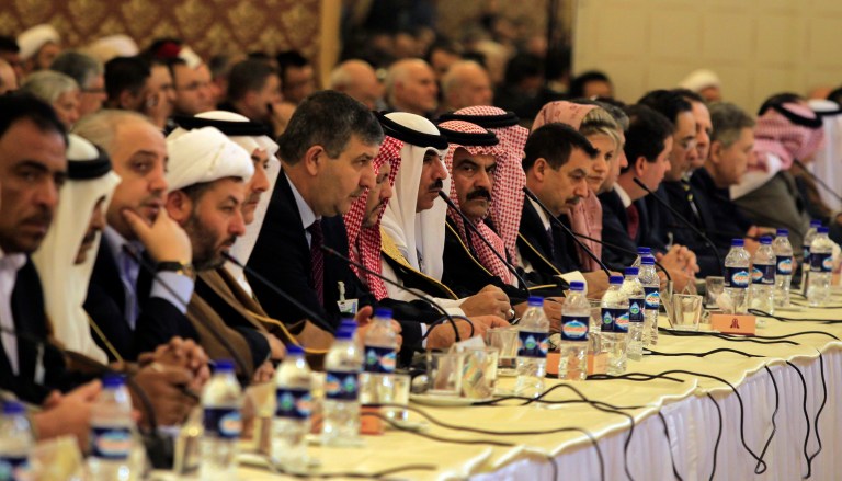   In this Sunday, Nov. 18, 2012 photo, participants listen to a speaker during the 'Syria National Dialog' conference, at the Esteghlal Hotel in Tehran, Iran. Just a day after Iran's foreign minister pledged unwavering support for the embattled Assad, officials in Tehran outlined on Sunday a step-by-step peace plan for Syria capped by elections that presumably could usher in a new leader in Damascus. (AP Photo/Vahid Salemi)  