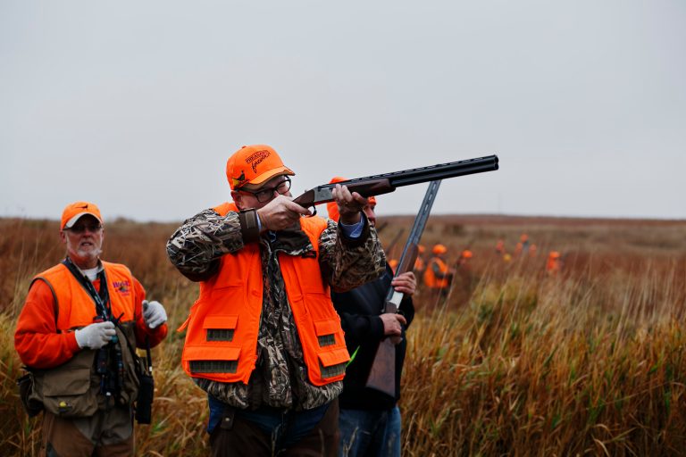Republican presidential candidate Rick Santorum lines up a shot as he hunts pheasants at The Hole N the Wall LodgeÂ at Rep. Steve King's annual Col. Bud Day Pheasant Hunt in Iowa.Â (Brian Powers/The Des Moines Register via AP)
