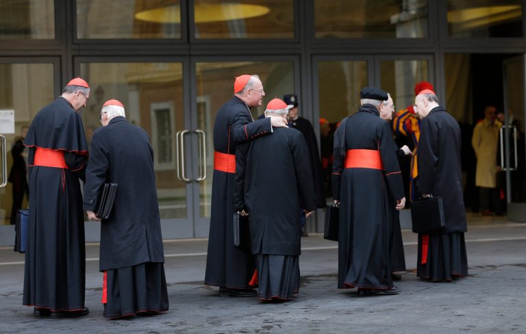Cardinals, including U.S. Roger Mahony, left, and Timothy Dolan, third from left, arrive for a meeting at the Vatican, Monday March 11, 2013. Cardinals have gathered for their final day of talks before the conclave to elect the next pope amid debate over whether the Catholic Church needs a manager pope to clean up the Vatican's messy bureaucracy or a pastoral pope who can inspire the faithful and make Catholicism relevant again. (AP Photo/Alessandra Tarantino)