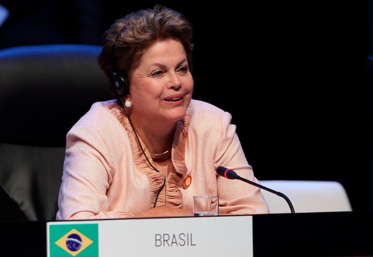 Travelling leftward to Dilma Rousseff, Brazil has built a huge current-account deficit while pulling back on free trade. (AP/ Ismael Francisco)