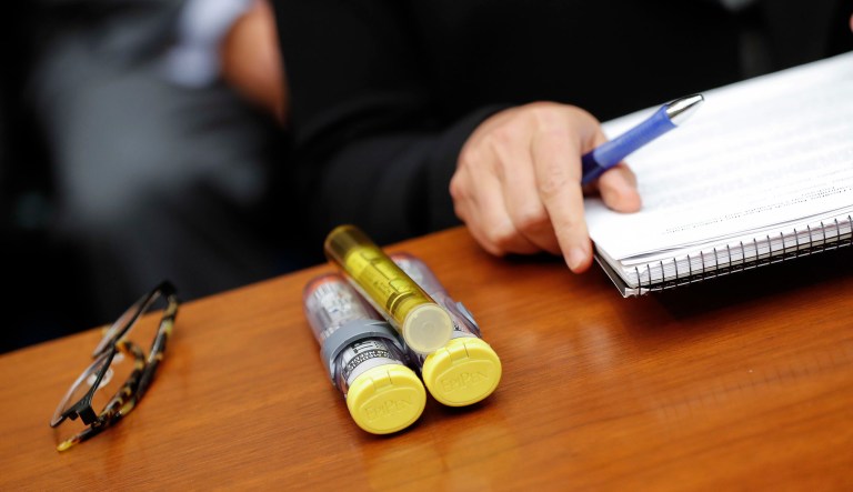 Mylan has agreed to repay $465 million to the federal government for overbilling for its lifesaving EpiPen allergy antidote. The settlement comes at the end of an investigation that found Mylan avoided paying state Medicaid programs higher rebates for the EpiPen by improperly naming it as a generic medication. (AP Photo/Pablo Martinez Monsivais, File)