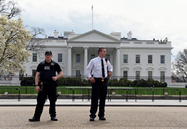 Members of the Secret Service stand on Pennsylvania Avenue outside the White House in Washington, Tuesday, April 7, 2015. (AP Photo/Susan Walsh)