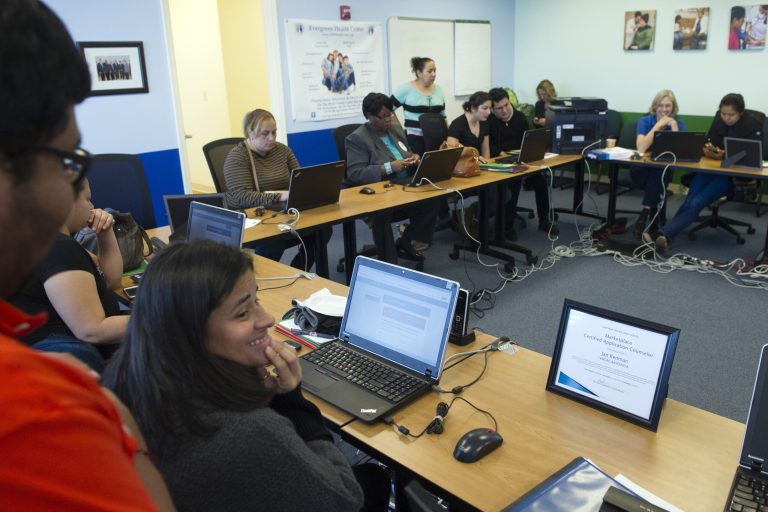 Prince William County, Virginia residents use HealthCare.gov to research health care insurance at the Greater Prince William Community Health Center, Evergreen Terrace Site, in Manassas, Va., Saturday, Nov. 15, 2014. (AP Photo/Cliff Owen)