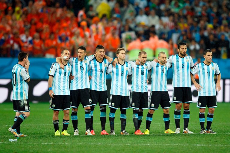 The Argentinian soccer team watches nervously during the penalty shoot out at the 2014 FIFA World Cup semifinals game against the Netherlands Thursday in Brazil. Argentina won the game. (Rex Features via AP Images)