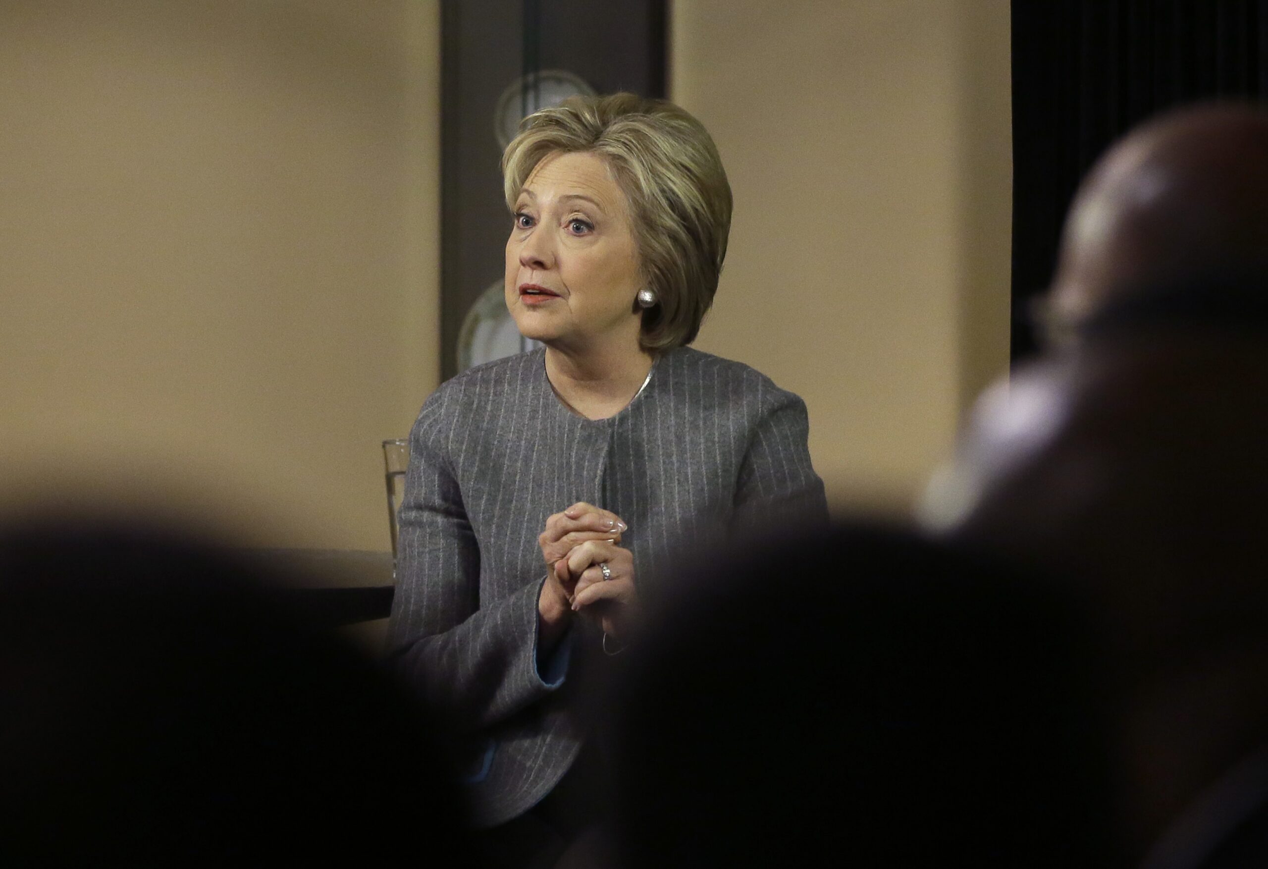 Clinton brushes off losses as delegate count grows