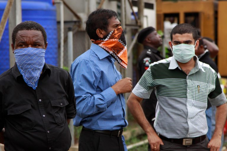   Family members who lost their loved ones at a plane crash wait to identified their bodies at the Lagos state university teaching hospital in Lagos, Nigeria, Tuesday, June 5, 2012. A commercial airliner crashed into a densely populated neighborhood in Nigeria's largest city on Sunday, killing all 153 people on board and others on the ground in the worst air disaster in nearly two decades for the troubled nation. (AP Photo/Sunday Alamba)  