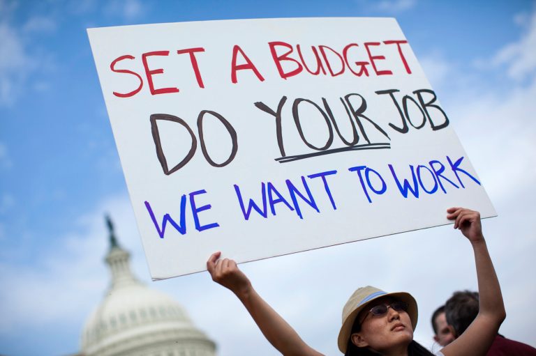 With most of the Department of Defense's workers heading back to work this week, Goldman Sachs estimates that the effect of the government shutdown on the nation's Gross Domestic Product will only be negative 0.2 to 0.14 percentage points per week. (AP/Evan Vucci)