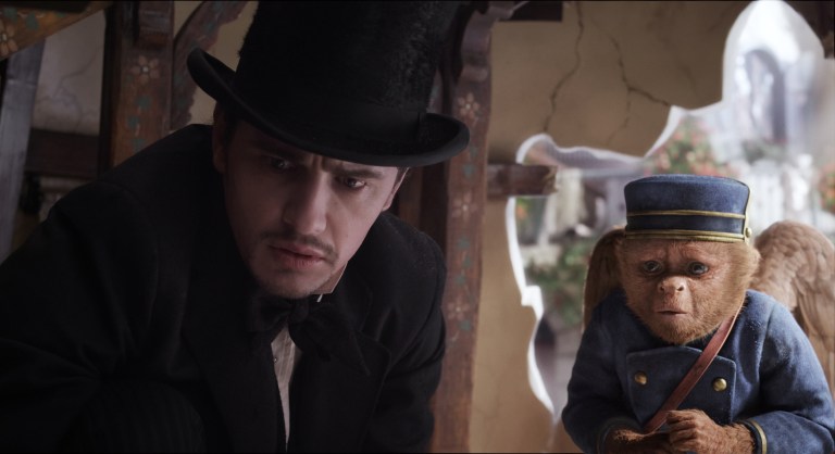 FILE - This file film image provided by Disney Enterprises shows James Franco, as Oz, left, and the character Finley, voiced by Zach Braff, in a scene from 