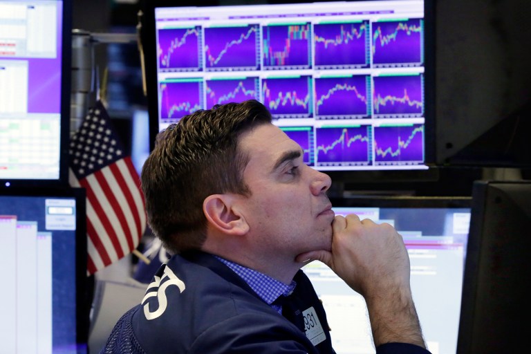 The stock market indicator hit the 20,000 mark partly in response to strong corporate earnings reports. (AP Photo/Richard Drew)
