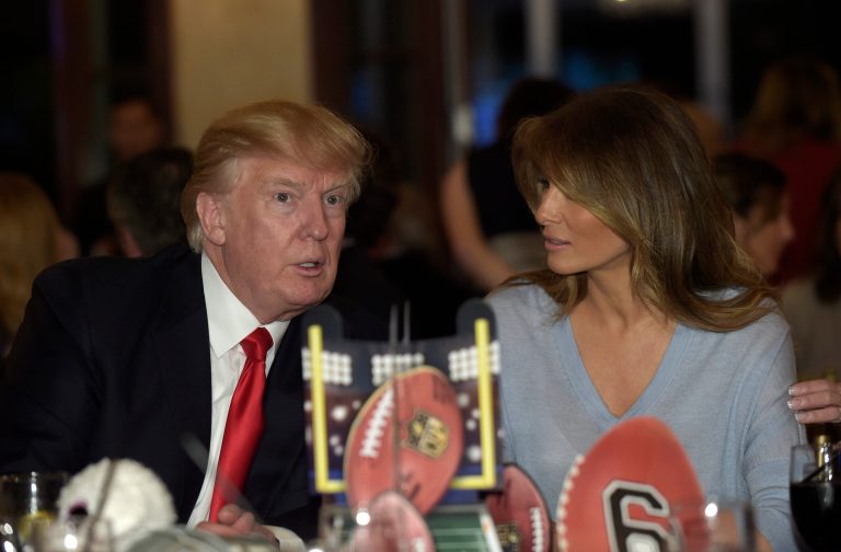 President Donald Trump and first lady Melania Trump watch the Super Bowl at a party at Trump International Golf Club in West Palm Beach, Fla., Sunday, Feb. 5, 2017. (AP Photo/Susan Walsh)