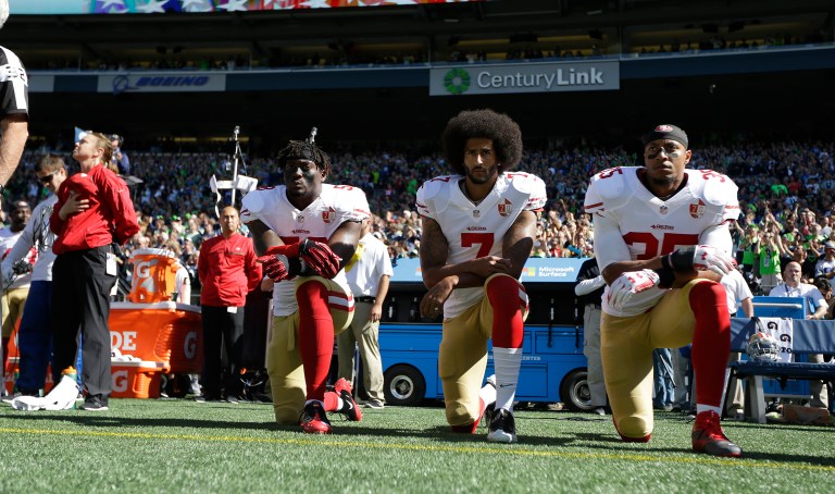 President Obama Wednesday night said U.S. service members fight so that people like the 49ers quarterback Colin Kaepernick can express their views and take a knew during the national anthem to make a point. (AP Photo/Ted S. Warren)