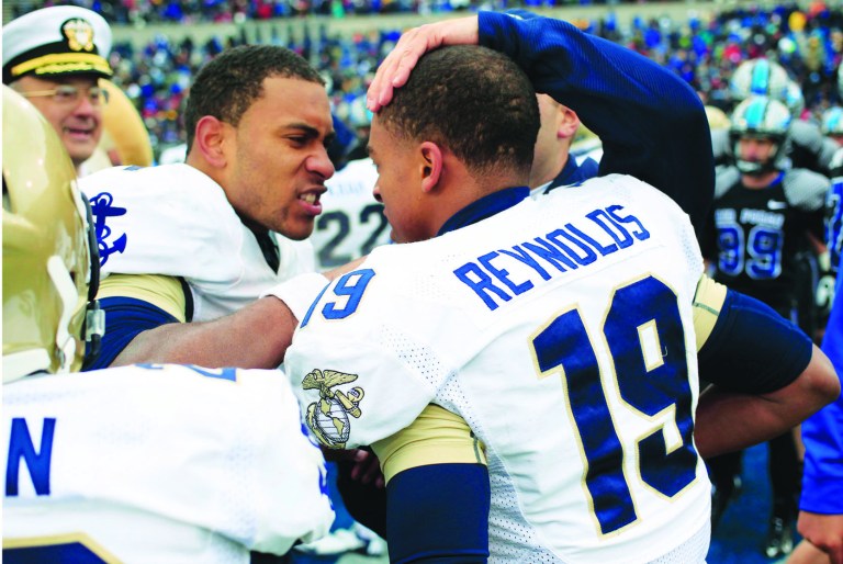 David Zalubowski/AP
Trey Miller and Keenan Reynolds helped Navy improve to 2-3 with a win over Air Force.