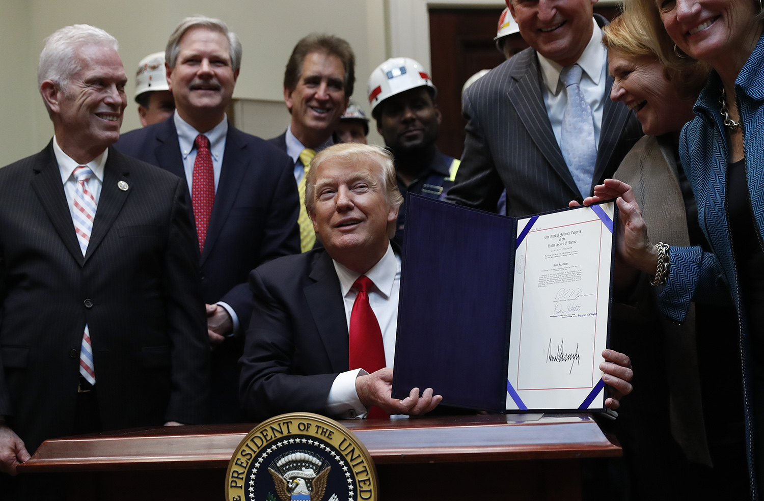 Big coal companies press Trump not to leave climate deal