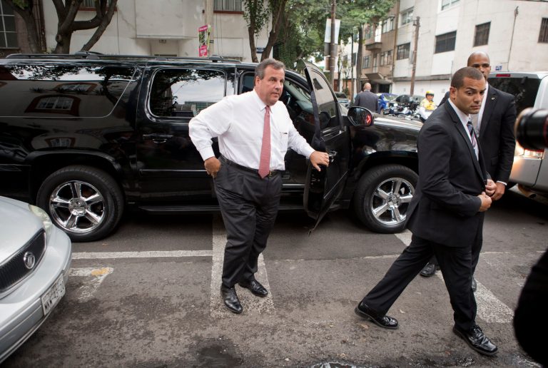 New Jersey Gov. Chris Christie is accompanied by a security detail as he arrives to have lunch at Tacos El Caminero in Mexico City, Thursday, Sept. 4, 2014. The potential 2016 U.S. presidential contender has called his three-day trade mission to Mexico a learning opportunity. (AP Photo/Rebecca Blackwell)
