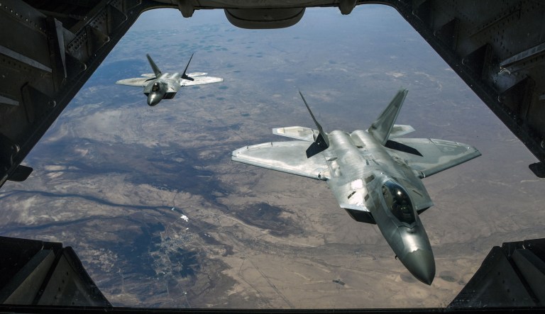 In this Air National Guard photo from Friday, two Air Force F-22 Raptors fly over Syria while supporting Operation Inherent Resolve. (Department of Defense / Staff Sgt. Colton Elliott)