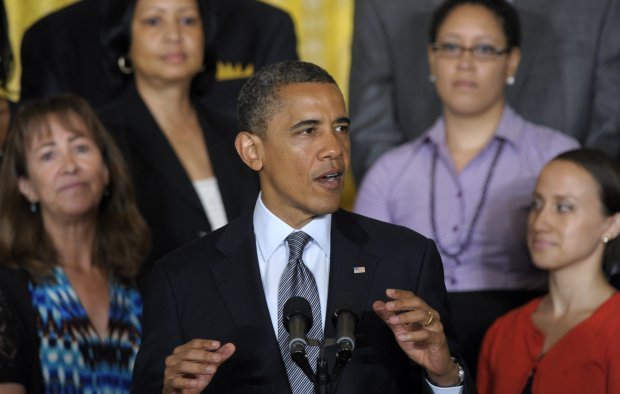 President Barack Obama calls on Congress to pass a temporary, one-year extension of the Bush-era tax cuts for people who make less than $250,000 a year, during a statement in the East Room of the White House in Washington on Monday. (AP Photo/Susan Walsh) 