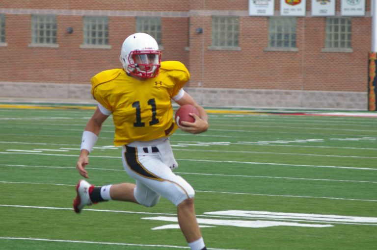  True freshman Perry Hills made plays at quarterback with his legs, arm, and poise in Maryland's scrimmage on Saturday. / Photo by Kevin Dunleavy 