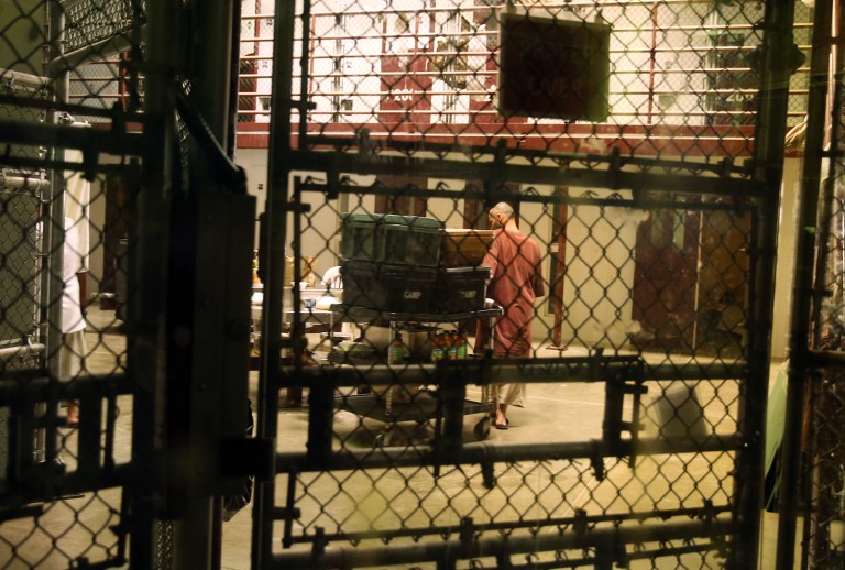 The transfer leaves 59 prisoners at the controversial detention facility. (AP Photo/Ben Fox)