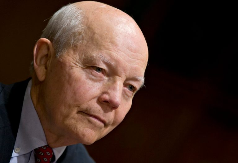 John Koskinen, President Barack Obama's choice to head the Internal Revenue Service (IRS) testifies on Capitol Hill in Washington, Tuesday, Dec. 10, 2013, before the Senate Finance Committee hearing on his nomination. Koskinen, 74, is a retired corporate and government official with experience managing numerous organizations in crisis. (AP Photo/J. Scott Applewhite)