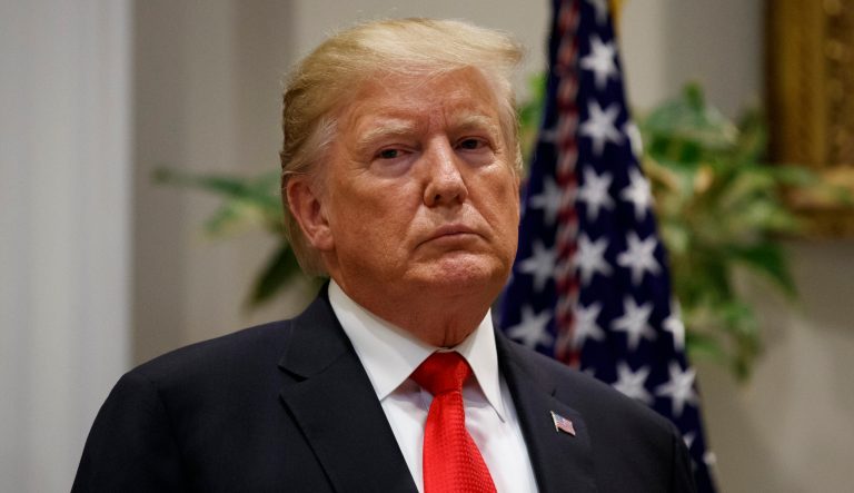 President Donald Trump stands in the Roosevelt Room of the White House.