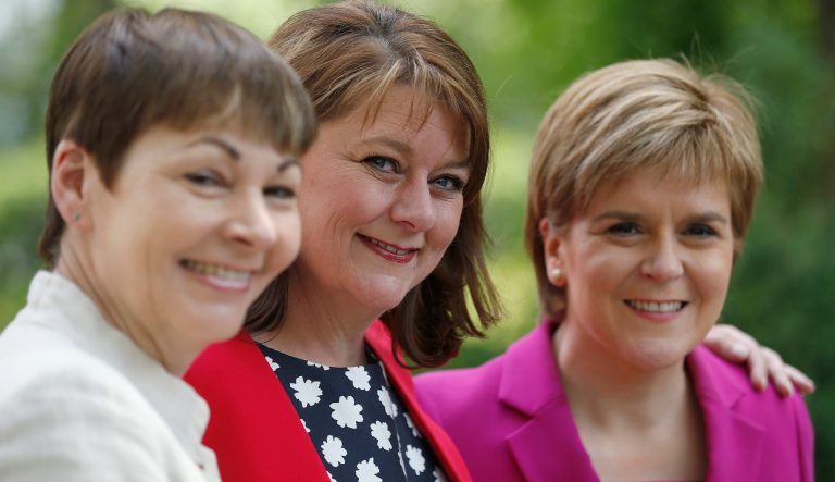 Scottish First Minster Nicola Sturgeon, right, Plaid Cymru Leader Leanne Wood, center, and Green MP Caroline Lucas