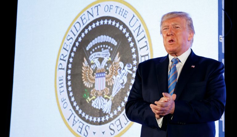 UPDATED: Trump gives speech in front of altered presidential seal: '45 is a puppet' President Donald Trump arrives to speak, with an altered presidential seal behind him, at Turning Point USA's Teen Student Action Summit 2019.