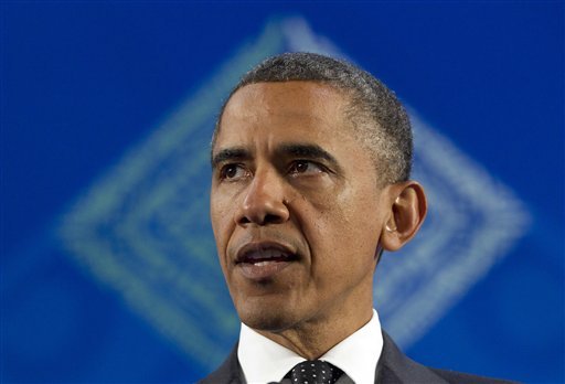 Obama asserts privilege he once derided