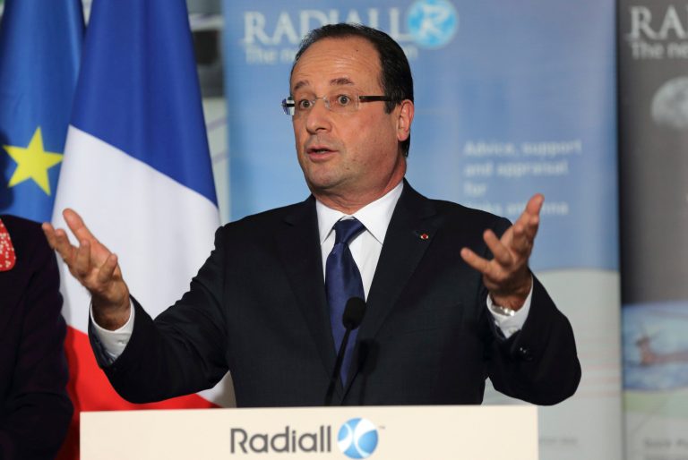   French President Francois Hollande, delivers a speech as he visits the Radiall engineering and coaxial connectors plant in Chateau-Renault, central France, Monday, Dec. 17, 2012. (AP Photo/Philippe Wojazer, Pool )  